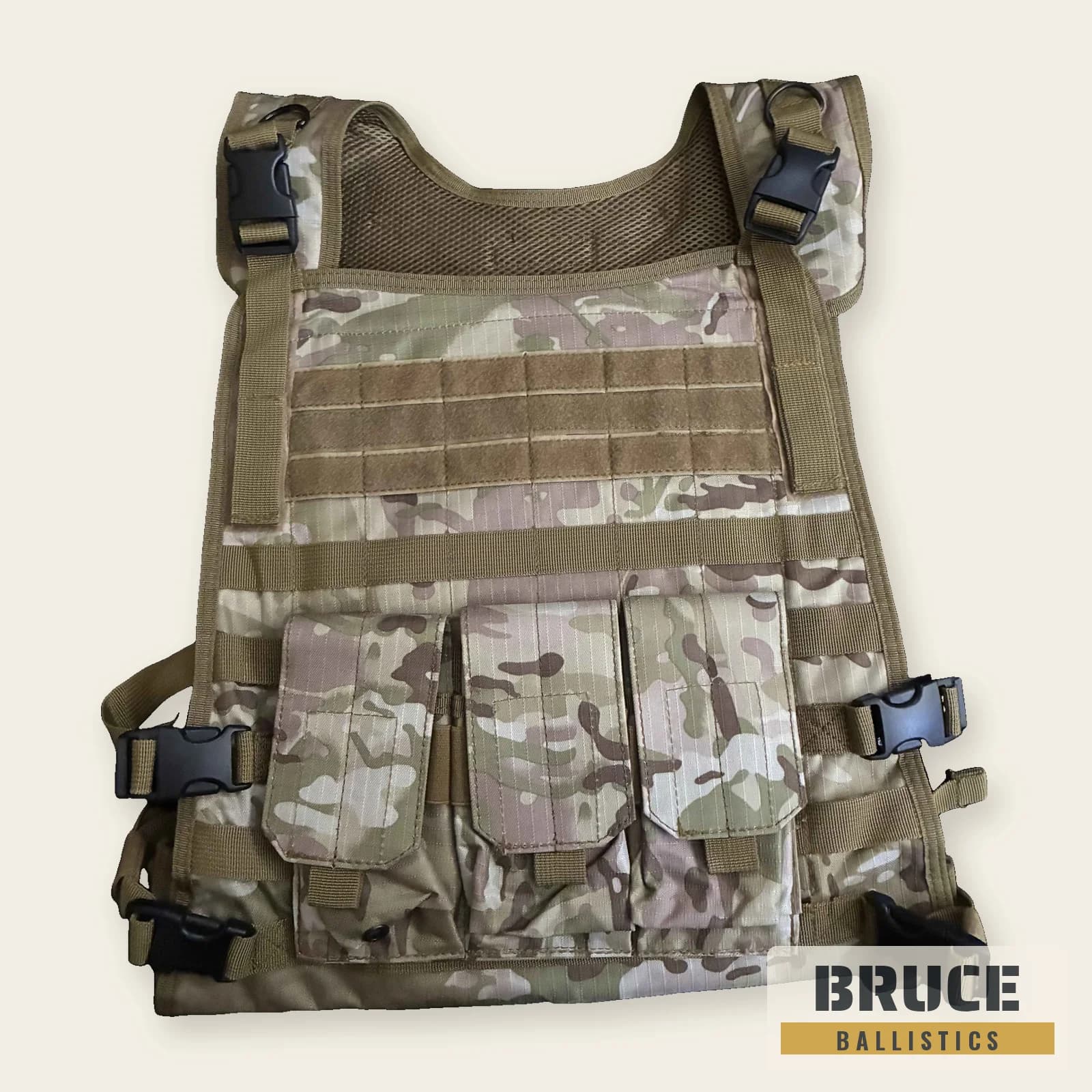 MOLLE tactical vest in a Multicam-style camo pattern, front: triple rifle magazine pouch, utility pouches, MOLLE webbing and quick-release shoulder buckles